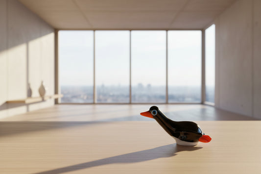 Sliding penguin glass figurine 
