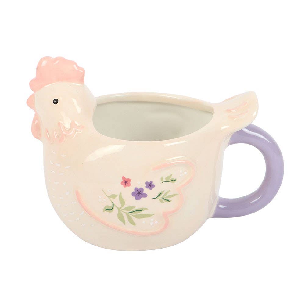 Ceramic mug shaped like a chicken with a purple handle on a white background