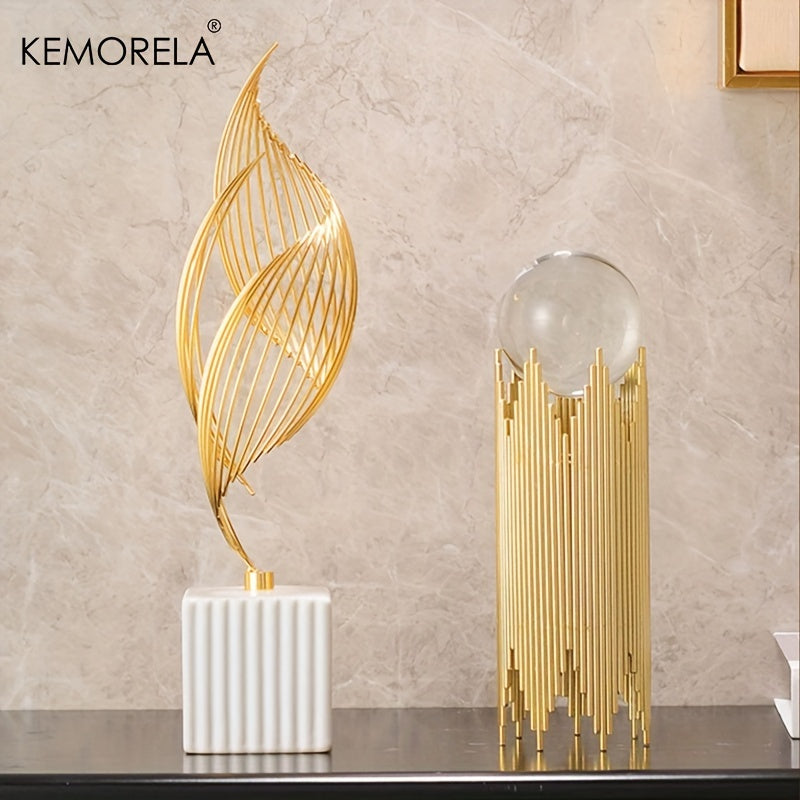 Decorative gold sculptures on a neutral background with KEMORELA branding.