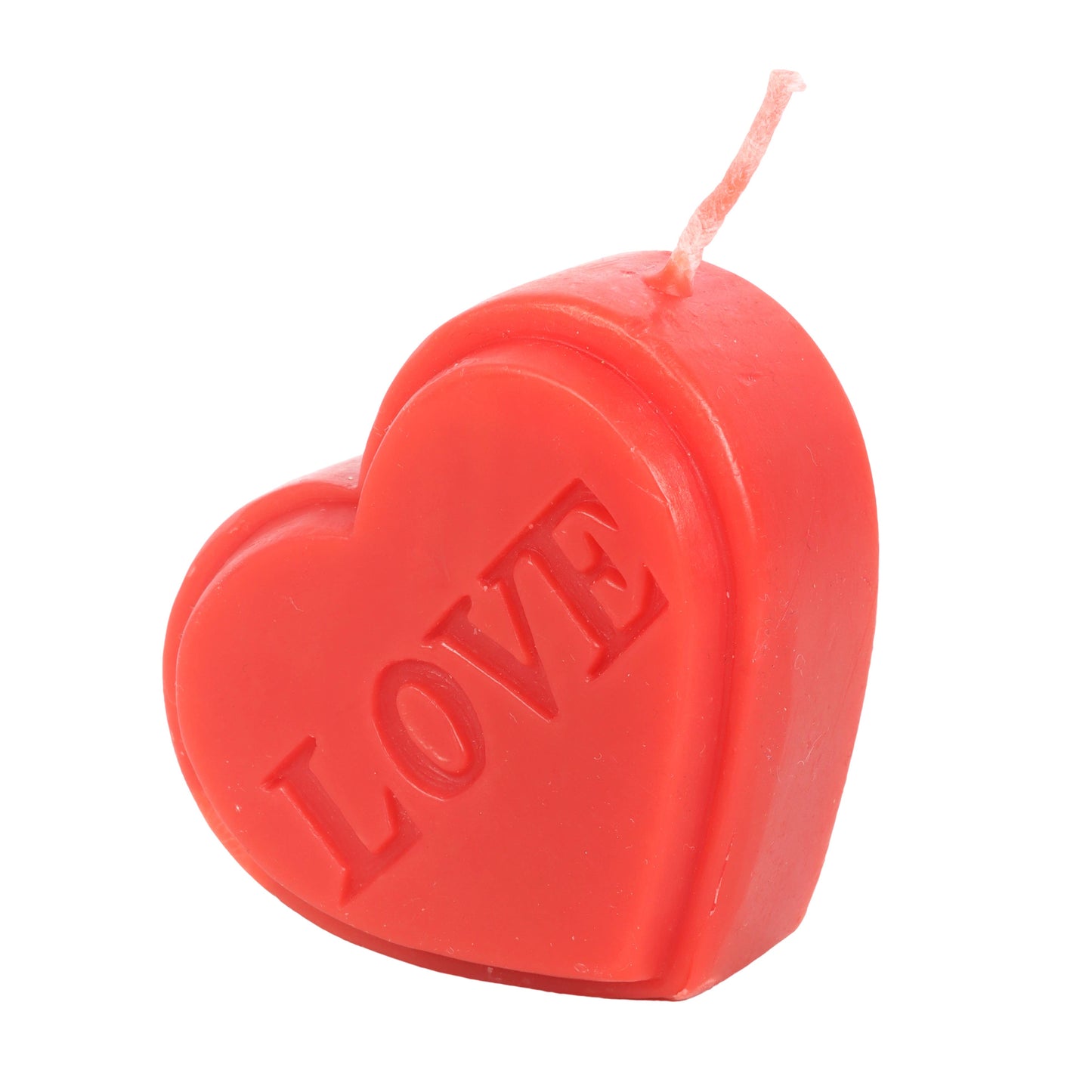Red heart-shaped candle with 'LOVE' text on a white background