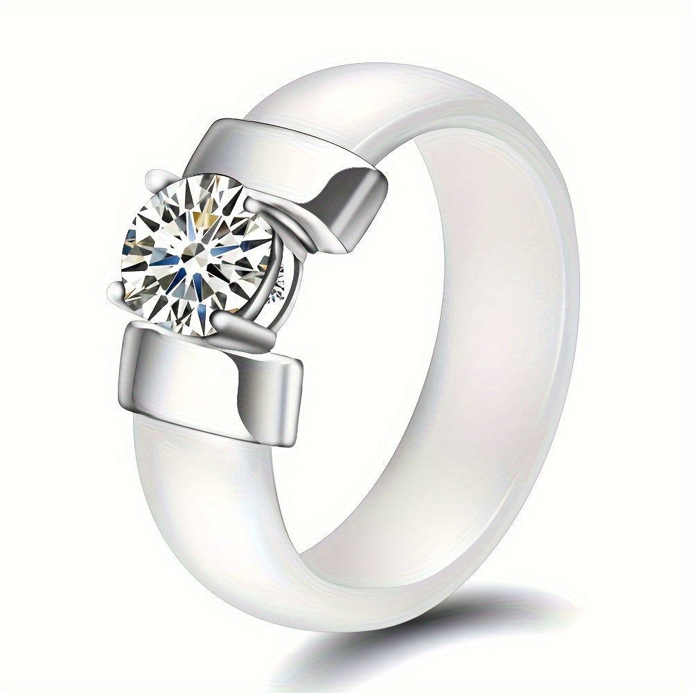 Silver ring with a diamond on a white background